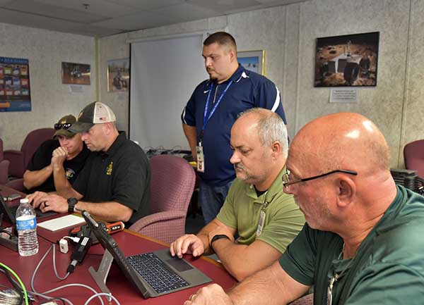 Bomb Squad techs learn the ins and outs of XTK software during a recent training session at Sandia. (Photo by Randy Montoya)