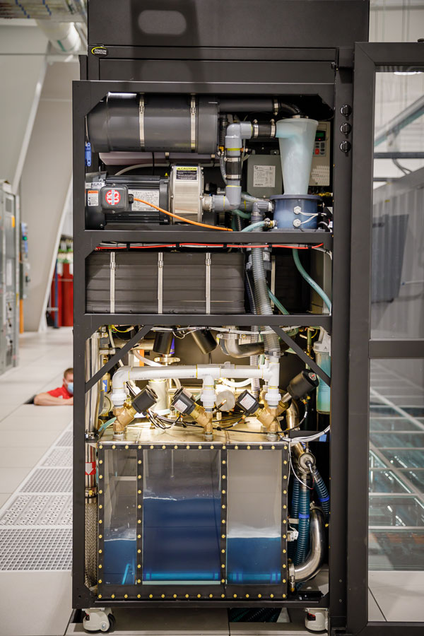NETWORKING — The Cooling Distribution Unit pumps cool water into a network of tubes that runs through the floor of the facility and inside the computers.