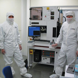Students in the clean room at the Universidad Autnoma de Ciudad Jurez in its Centro de Investigacin en Ciencia y Tecnologa Aplicada are ready for serious work. Professor Jose Mireles, head of this research center, has worked with Sandia for some time. SandiaÕs MOU with the University of Guadalajara will open MEMS education opportunities to more Mexican students.