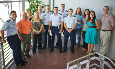 US COAST GUARD cadet interns with mentors and program coordinators at Sandia.