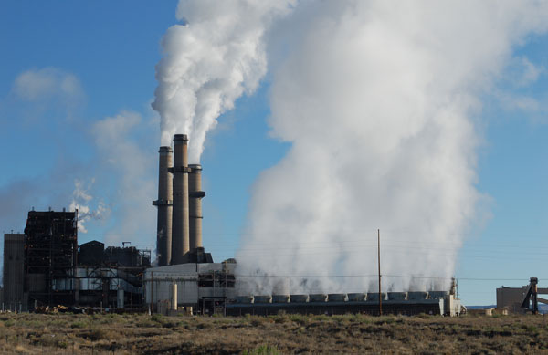 STEAM POWER — Steam generated from a bank of cooling towers at the San Juan Power Plant in northwestern New Mexico portrays one connection between water supply and energy. Like household air conditioners, cooling towers transfer heat from the power plant to the environment. Removing the heat allows the steam from the plant’s turbines to condense from a gas into a liquid. Researchers are seeking ways to capture it and reduce the amount of water used by fossil fuel-fired power plants. (Photo by Vince Tidwell)