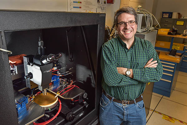 ULTRAWIDE BANDGAP RESEARCH — Sandia electrical engineer Bob Kaplar heads a project studying ultrawide bandgap semiconductor materials. The project is answering such questions as how materials behave and how to work with them, which are steps toward improving everything from consumer electronics to power grids. (Photo by Randy Montoya)
