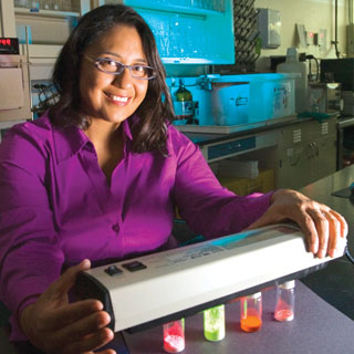 BERNADETTE HERNANDEZ-SANCHEZ, at home in her lab, is one of Hispanic Engineer and Information\ Technology magazines Forty Under Forty rising stars. (Photo by Randy Montoya)