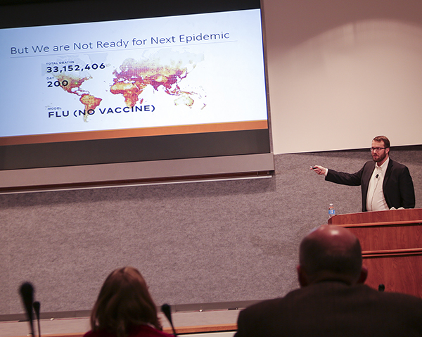 Philip Eckhoff, guest speaker from the Institute for Disease Modeling, talks about how he uses computer modeling to help eradicate diseases at the second Sandia Science and Technology Speaker Series held Nov. 29. (Photo by Lonnie Anderson)