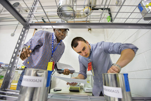 ITC participants check a few randomly selected mock nuclear items. This nuclear material accountancy and control method can detect and deter insider threats, as well as detect minor irregularities due to human error.
