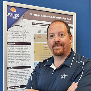 INFORMATION TECHNOLOGY HONOREE Sean Lee Hendrickson is Sandia's NNSA Defense Programs Employee of the Quarter. Sean (9517) led the deployment of the first production implementation of Oracle Data Integrator in Sandia's Science and Engineering Information Systems and produced a map for future migrations from Sandia's current tool. The conversion required setting up new servers, training people, and figuring out how to test and release the new tool. (Photo by Randy Montoya)