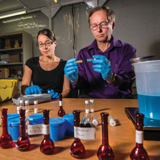 Image of <p class="wp">BOMB-PROOFING FERTILIZER — Chemical engineer Vicki Chavez (6633) worked with now-retired Kevin Fleming to prove that iron sulfate mixed with ammonium nitrate could produce a non-detonable fertilizer. (Photo by Randy Montoya)</p>