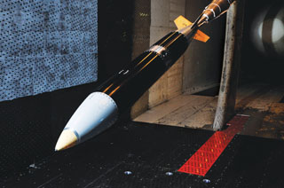 B61-12 wind tunnel model in the US Air Force Arnold Engineering and Development Center wind tunnel at Arnold Air Force Base in Tennessee.	(Photo courtesy of NNSA)