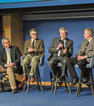 Image of <p>SANDIA FELLOWS, from left, Ed Cole, Jeff Brinker, Jerry Simmons, and John Rowe answer questions during a Q&A session following their individual talks about their research interests. (Photo by Randy Montoya)</p>