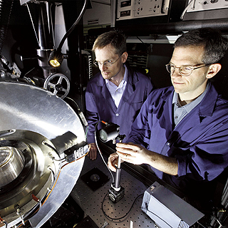 Image of Energy synergy - Lyle Pickett, right, and Chuck Mueller (both 8362) are   working on a project that could overcome the practical limitations of   the Leaner Lifted-Flame Combustion engine, shown here in a test version.   Paired with the right biofuel, the two technologies could enable a   highly efficient, low-emission combustion strategy. (Photo by Randy   Wong) <a href="http://www.sandia.gov/ess/" target="_blank" rel="noopener"></a><a href="/news/publications/labnews/archive/_assets/images/12-15-06/biofuels.jpg">View large image</a>.