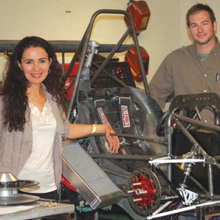 SANDIA ENGINEER Imane Khalil and project manager Garrett Kuehner work together on the University of New Mexico’s 2012 Formula SAE race car. Imane teaches engine theory to the student team led by Kuehner. This year’s car is a few weeks away from completion. It will compete in June against cars built by undergraduate student teams from across the country.