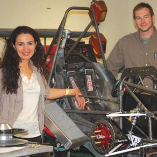 Image of SANDIA ENGINEER Imane Khalil and project manager Garrett Kuehner   work together on the University of New Mexico’s 2012 Formula SAE race   car. Imane teaches engine theory to the student team led by Kuehner.   This year’s car is a few weeks away from completion. It will compete in   June against cars built by undergraduate student teams from across the   country.<em> <a href="/news/publications/labnews/archive/_assets/images/12-04-05/race_1260.jpg">  </a></em><a href="/news/publications/labnews/archive/_assets/images/12-20-04/wind_1260.jpg">View large image</a>. <br/>