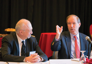 SANDIA PRESIDENT AND LABS DIRECTOR Paul Hommert, left, sat with Sen. Tom Udall at the inaugural summit of the New Mexico Collaborative Research & Development Council. Udall and Sen. Martin Heinrich invited the heads of the state’s universities, research laboratories, and military installations to work together to advance science and technology. (Photo by John Arnold)