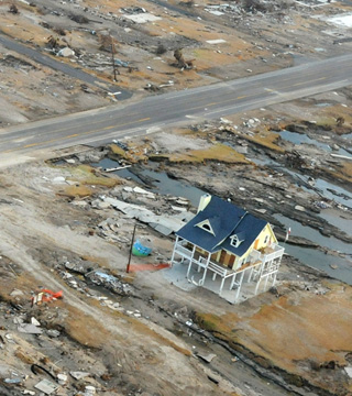 An aerial view of the damage Hurricane Ike inflicted upon Gilchrist, Texas. the last house standing on the waterfront at Gilchrist, Texas, in the wake of 2008s Hurricane Ike demonstrates the value of engineering buildings to withstand the forces to which they are they are likely to be exposed. (FEMA photo)