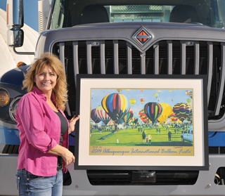 Semiramis Novak (102641), named for an aunt and a legendary queen of Assyria, is as comfortable with a paintbrush as with the wheel of a big rig. Her painting was named the official poster of the 2014 Albuquerque International Balloon Fiesta. (Photo by Randy Montoya)