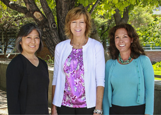 Cynthia Nitta, left, from Lawrence Livermore National Laboratory, Wendy Baca, center, Los Alamos National Laboratory, and Sheryl Hingorani, from Sandia, lead a team that is developing plans and options for future strategy.	(Photo by Stephanie Blackwell)