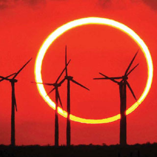 A just-released study by Sandia researchers promises to help the nation’s wind power plants, like this 160-turbine facility near Fluvanna, Texas, benchmark their performance, understand vulnerabilities, and enhance productivity. The above photo was shot by Gary Froehlich (5345) during the May 2012 annular solar eclipse. Gary spent several months planning the shot, studying the options and calculating the optimal location and foreground visuals before determining that the Brazos Wind farm in Fluvanna filled the bill. He writes that the clouds parted that day just in time for him to capture this striking photograph. (Photo by Gary Froehlich)