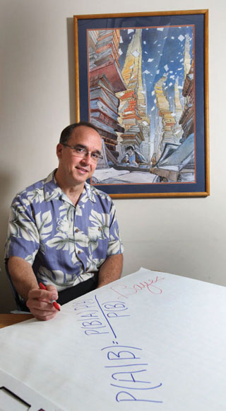 Philip Kegelmeyer uses the Bayes Rule, a theorem of probability theory, to evaluate the bozometer results. In cautioning about the potential pitfalls of relying too heavily on big data, Philip notes that if a bozometer worked with 99.99 percent accuracy, it would return more than 300,000 false readings when sampling the US population — 300,000 people incorrectly deemed to be bozos. (Photo By Dino Vournas)