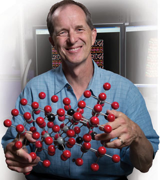 Randy Cygan (6910) says molecular modeling sheds light on how a waste repository might perform. “It allows us to develop performance assessment tools the Environmental Protection Agency and Nuclear Regulatory Commission need to technically and officially say, ‘Yes, let’s go ahead and put nuclear waste in these repositories.’”	(Photo by Lloyd Wilson)