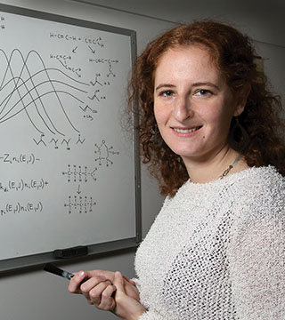 Judit Zádor’s KinBot code looks for 3-D structures in chemical reactions to quickly make predictions about behavior of potential reactions in combustion for a given molecule. With these predictions, scientists can identify the rates at which relevant reactions take place, information that is critical to understanding combustion. (Photo by Dino Vournas)