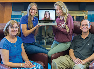 The Williams triplets, from left, Alicia, Megan — on Skype from Los Angeles — and Stephanie, are flanked by their parents Steve (5954) and Jayne. “I’m trying not to think about our empty nest after they’re gone,” Jayne says. “I’m excited for them that they’re heading off and getting settled in their new lives.” (Photo by Randy Montoya)