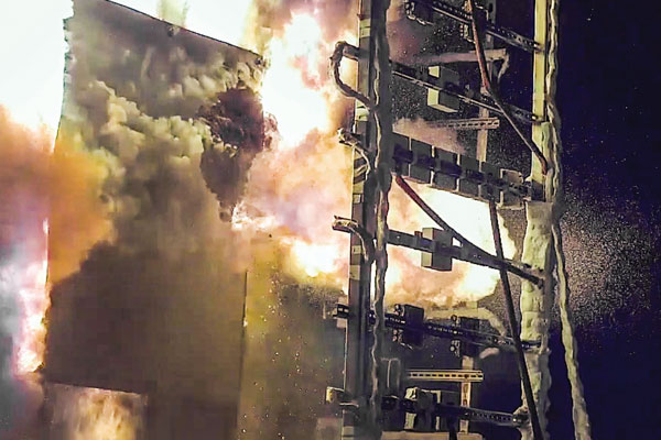 VAPORIZED STEEL — High-speed video footage taken by researchers at Sandia shows a high-energy arcing fault vaporizing a steel panel of power plant equipment, providing data that could help keep power plants operating safely. (Photo courtesy of Sandia National Laboratories)