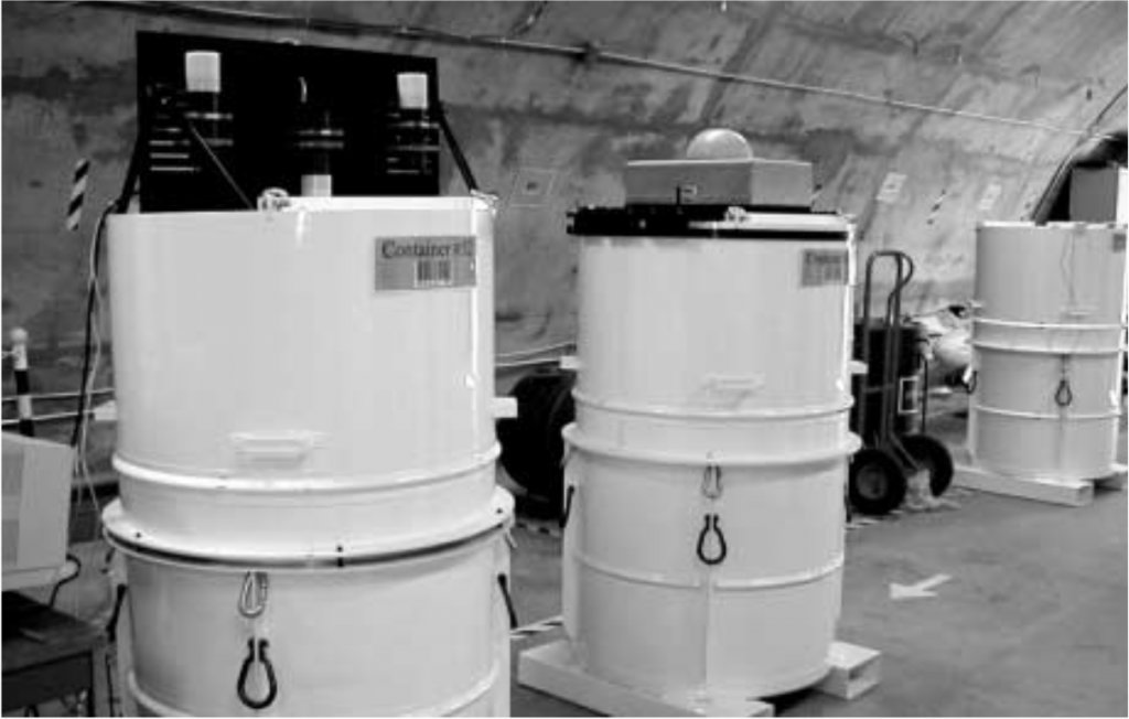 THE MOST RECENT version of the Radiation Continuity Checker is shown at left, atop mock warhead container #52in a bunker at Sandia/New Mexico. This version uses active collimation to eliminate background radiation, whichobviates the need for heavy shielding around the detector.
