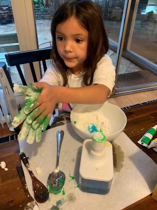 Image of Debbie Senesky's daughter participates in a hands-on STEM activity