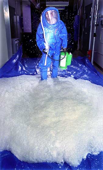 Image of Researcher demonstrates decontamination foam