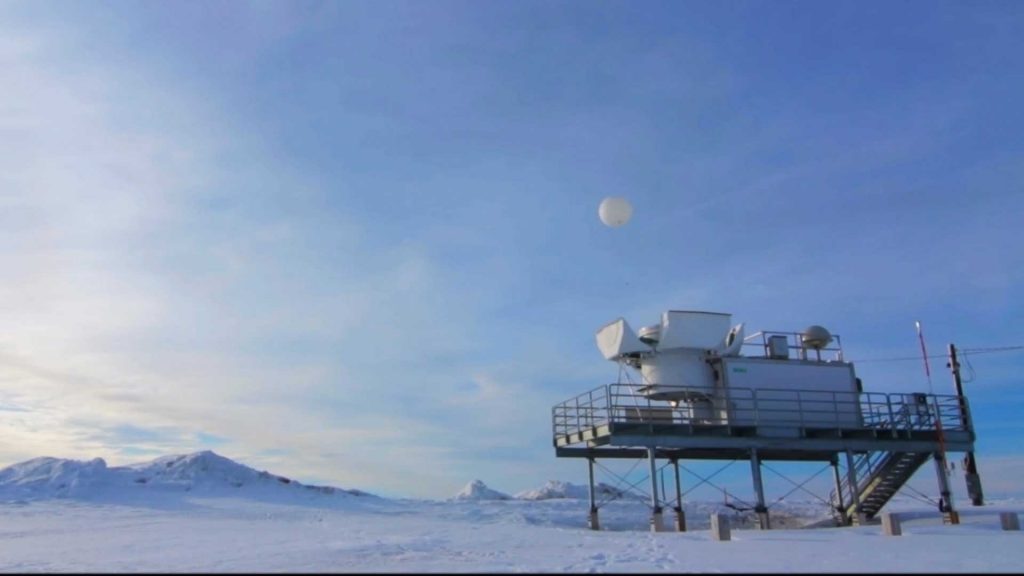 UP, UP AND AWAY — A weather balloon launches automatically from Atmospheric Radiation Measurement’s fixed observatory in Utqiaġvik, formerly known as Barrow. (Photos by Brent Peterson)