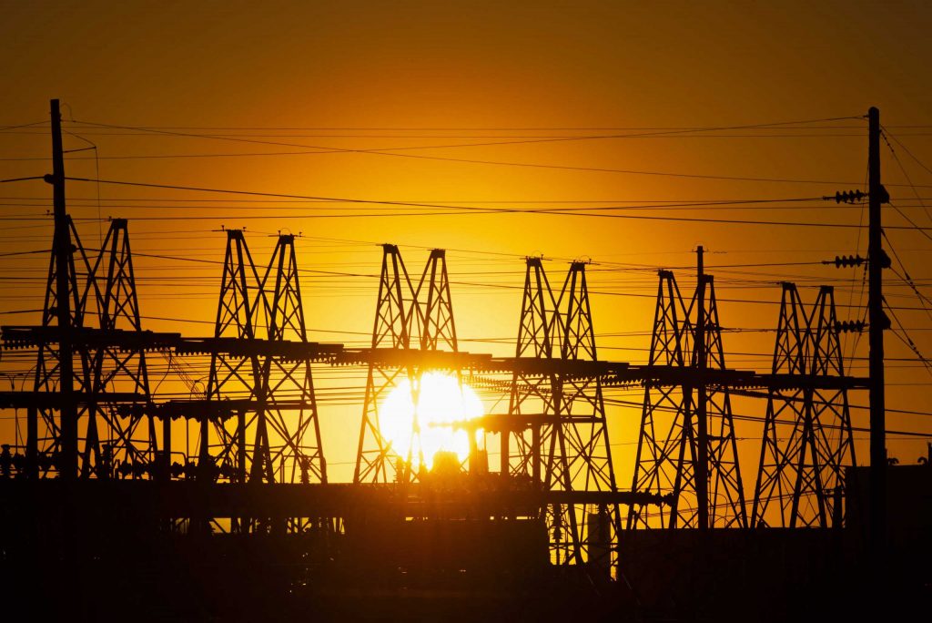 Image of Sunset over power lines
