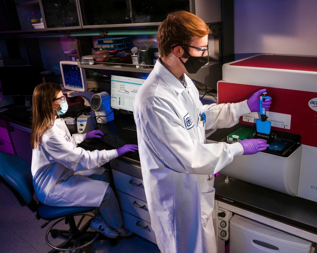 BIODEFENSE AND COUNTERING DISEASE — Christine Thatcher, left, and Peter McIlroy are members of the nanobody research team. With a rich history of biodefense research, Sandia helps protect the nation and the world from threats presented by bioterrorism and naturally occurring diseases.