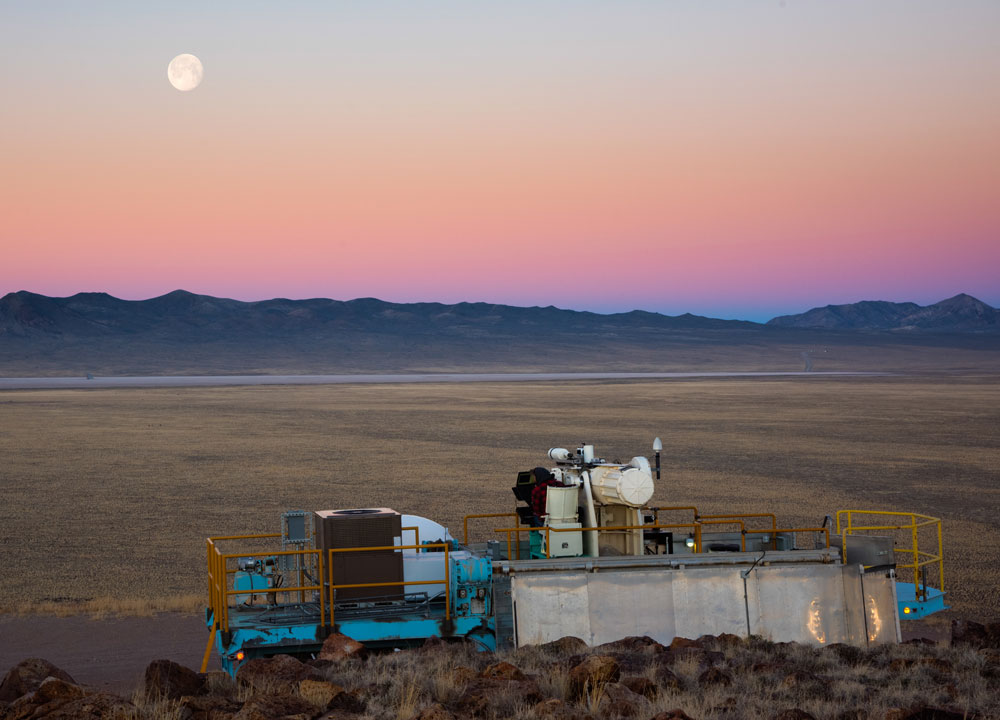 SCENIC VIEWS — Tonopah Test Range at night in May overlooking the target on Antelope lake. The trailer in the foreground holds the ME-16 telescope. (Photo by David Coleman)