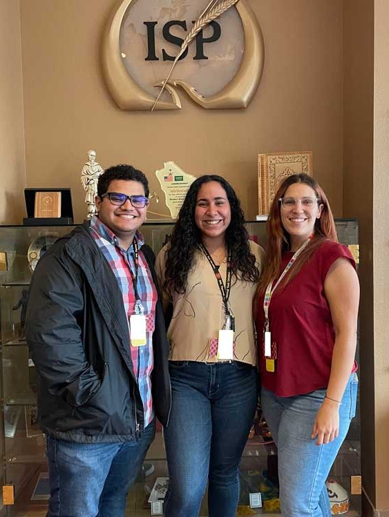 TOURING INTERNS — From left, interns Abner Vega, Sol Alverio and Namir Huertas tour Sandia’s Center for Global Security and Cooperation training center in Albuquerque. (Photo by Lu Hunter)
