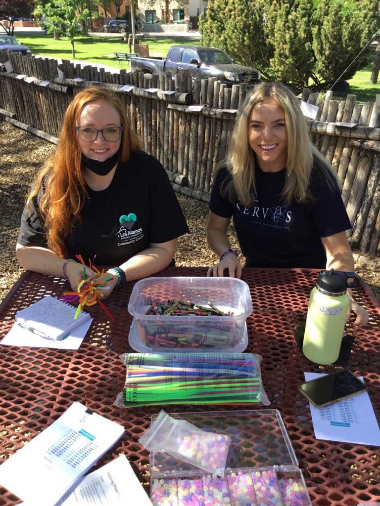 Image of Valerie Steinhaus and Sandian Dana Turon volunteer at STEM Day with Girls Inc.