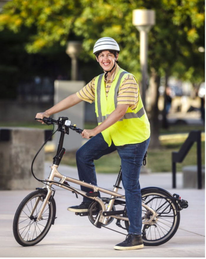 Image of Sandia chemical engineer Patrick Burton commutes to work on his bike