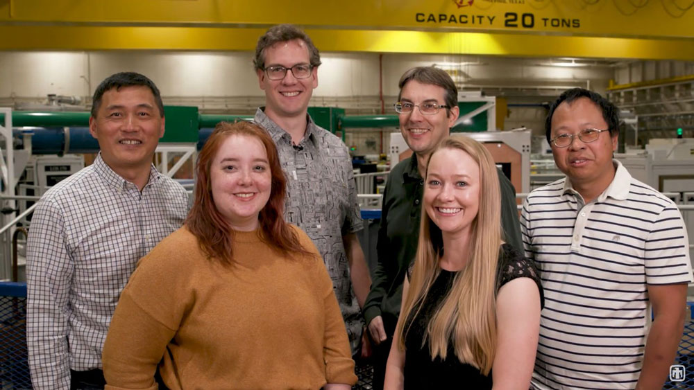Image of Sandia researcher Guangping Xu, right, with team of researchers, from left, Hongyou Fan, Haley Davis, Chad McCoy, Jens Schwarz and Melissa Mills
