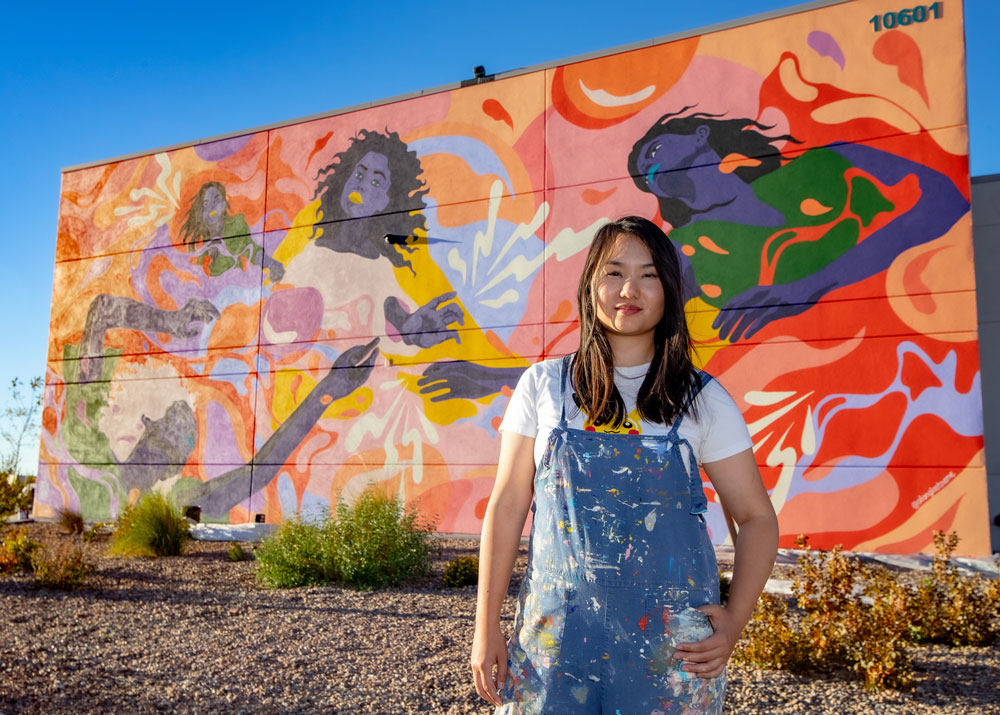 UPSCALING — Acclaimed artist Amanda Phingbodhipakkiya, with help from students at nearby Technology Leadership High School, painted a large mural in the heart of the Sandia Science & Technology Park. A second art installation is in early development. (Photo by Rebecca Gustaf)