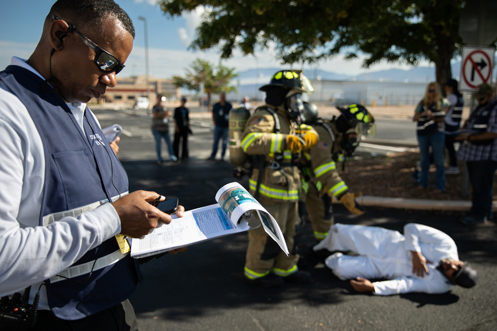 evaluator scans piece of paper