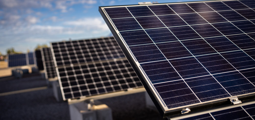 IN IT FOR THE LONG HAUL — Photovoltaic modules for long-term evaluation installed at Sandia’s Photovoltaic Systems Evaluation Laboratory in Albuquerque. (Photo by Craig Fritz)