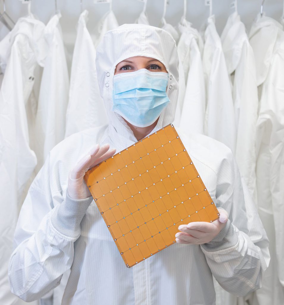 COMPUTING PARTNERS — A worker at Cerebras Systems holds the world’s largest computer wafer, to be used as part of the collaboration between Cerebras and three national labs. The partnership will accelerate future advanced simulation and computing applications in support of the national nuclear stockpile. (Photo courtesy of Cerebras Systems)