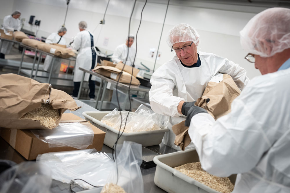 Image of Sandia fellows Keith Matzen and Bill Miller volunteer during Sandia's Fall Leadership Forum