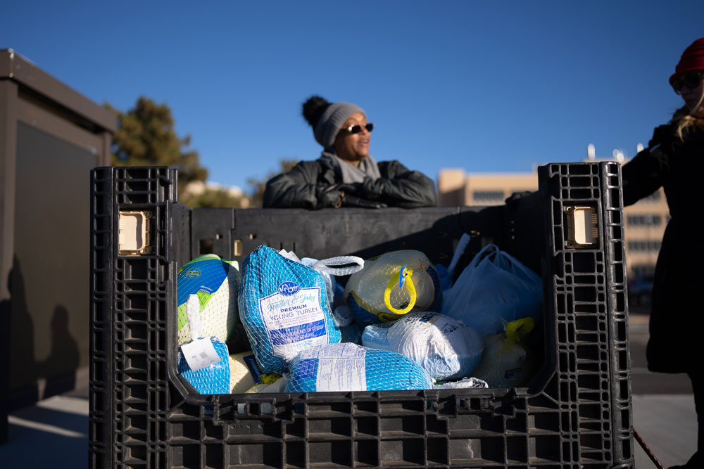 Image of Community Relations specialist Michelle Walker-Wade supervises turkey drop-off site