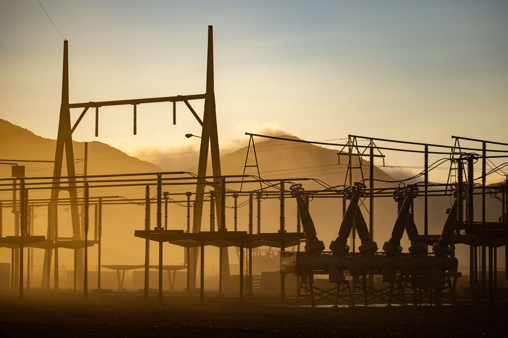 WEATHER OR NOT — Fog rises from an electrical substation in Albuquerque. Sandia computer scientists have created a computer algorithm to determine the best way to restore power to a grid after a disruption, such as a complete blackout caused by extreme weather. (Photo by Craig Fritz)