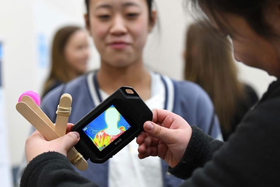 INFRARED ENCOUNTER — Students explored different temperatures of objects using infrared cameras at exploration stations during the Introduce a Girl to Engineering event in Amarillo, Texas. (Photo courtesy of the Pantex Plant)