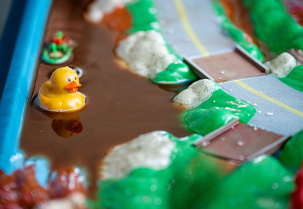 Image of A rubber duck sits in an example of stormwater run-off pollution during a demonstration by Sandia volunteers at San San Antonio Elementary School on March 6, 2023. Photo by Craig Fritz