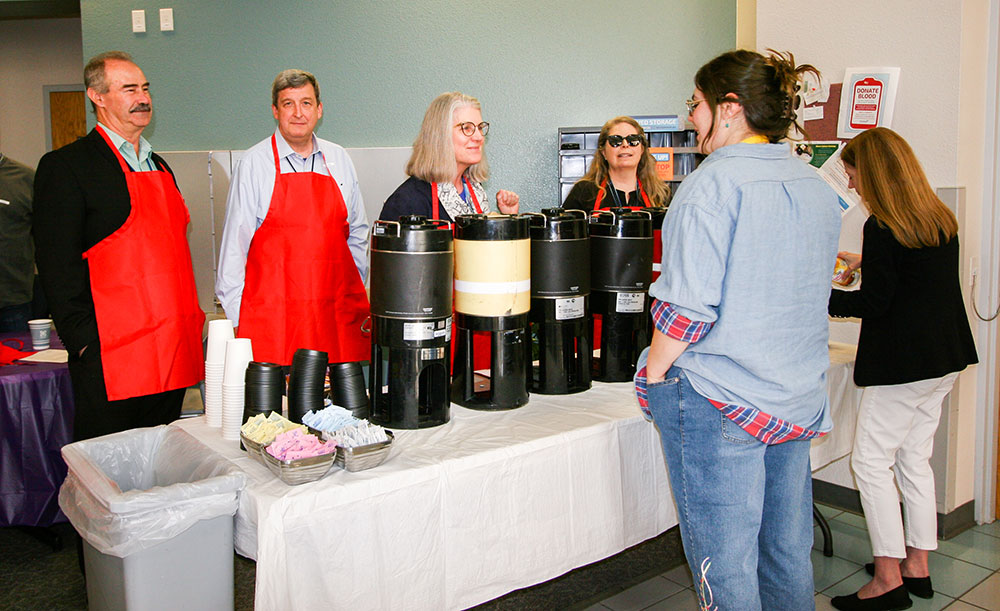 COFFEE AND ART — From left, Director Reno Sanchez, Director Dennis Helmich, National Security Programs Associate Labs Director Deborah Frincke and Director Kate Helean offer coffee and conversation to team members.