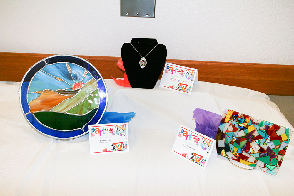 COLORFUL GLASS — The National Security Programs art show included stained glass pieces by systems engineer Mark Dietrich.