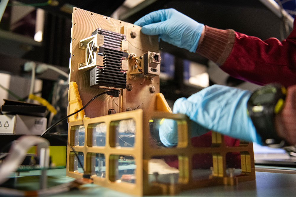 TESTING THE NEW — Placing this payload, which includes a computer chip with advanced processing capabilities, aboard the International Space Station will help Sandia researchers evaluate new high-performance computing technology for use in future space systems. (Photo by Craig Fritz)