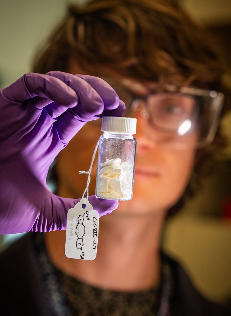 A NEW TYPE OF POLYMER — Eric Nagel showing the latest batch of material developed by his team as they work to reproduce a molecule that changes the traditional behavior of polymers.(Photo by Craig Fritz)